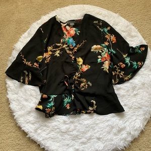 Black blouse with colorful floral print
